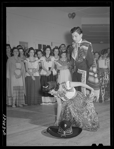 Untitled photo, possibly related to: Brownsville, Texas. Charro Days fiesta. Dancing the jarabe tapatia [i.e. Jarabe Tapatío] at Triple L Club dance