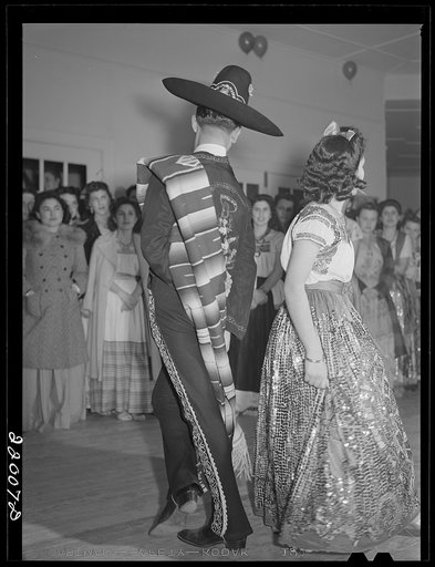 Untitled photo, possibly related to: Brownsville, Texas. Charro Days fiesta. Dancing the jarabe tapatia  [i.e. Jarabe Tapatío] at Triple L Club dance