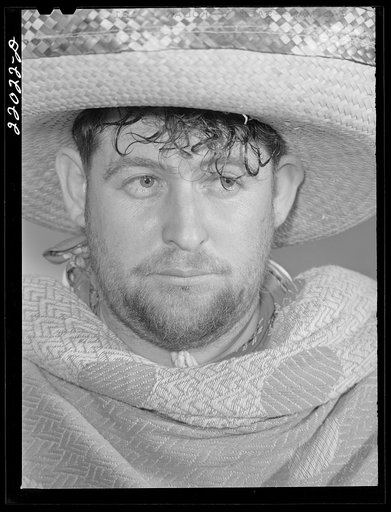 Brownsville, Texas. Charro Days fiesta. Member of local businessmen's committee dressed as Mexican bandido