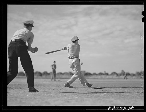 Untitled photo, possibly related to: Weslaco, Texas. FSA (Farm Security Administration) camp. Baseball game. Saturday afternoon