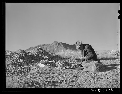 Prospector testing ore samples. Esmeralda County, Nevada