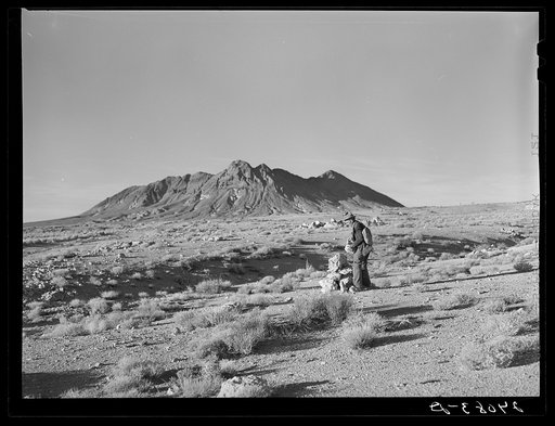 Prospector marking his claim. Esmeralda County, Nevada
