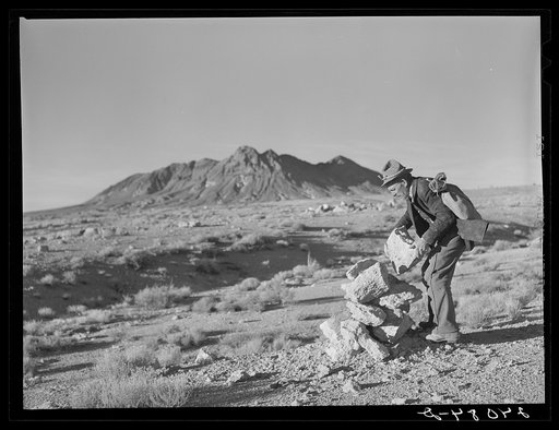 Untitled photo, possibly related to: Prospector marking his claim. Esmeralda County, Nevada