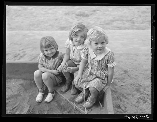 Children playing in sandbox. Tulare migrant camp. Visalia, California