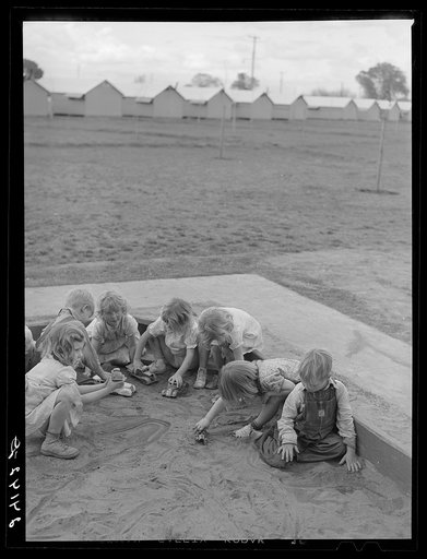 Children playing in sandbox. Tulare migrant camp. Visalia, California