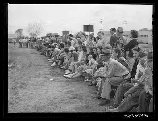 Untitled photo, possibly related to: Watching baseball game. Tulare migrant camp. Visalia, California