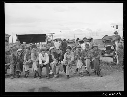 Untitled photo, possibly related to: Watching baseball game. Tulare migrant camp. Visalia, California