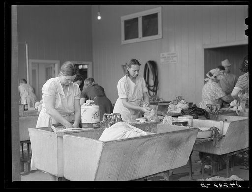 Women washing clothes. Tulare migrant camp. Visalia, California