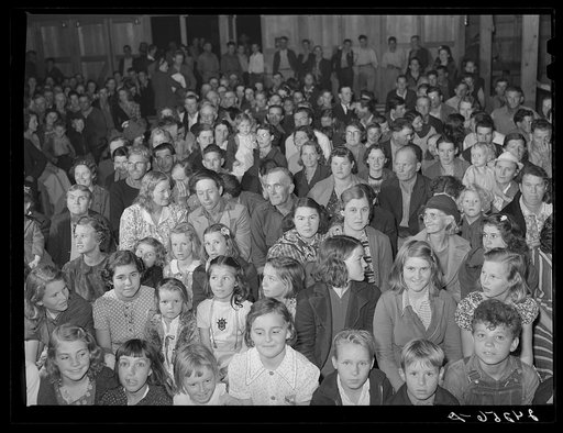 Audience watching play in recreation hall. Tulare migrant camp. Visalia, California