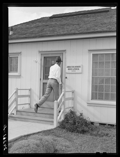 Patient entering health clinic. Shafter migrant camp. Shafter, California
