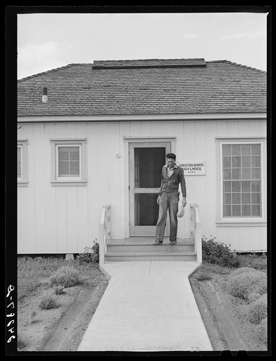 Patient leaving health clinic. Shafter migrant camp. Shafter, California