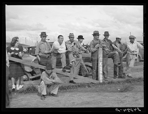 Watching a Sunday afternoon baseball game. Tulare migrant camp. Visalia, California