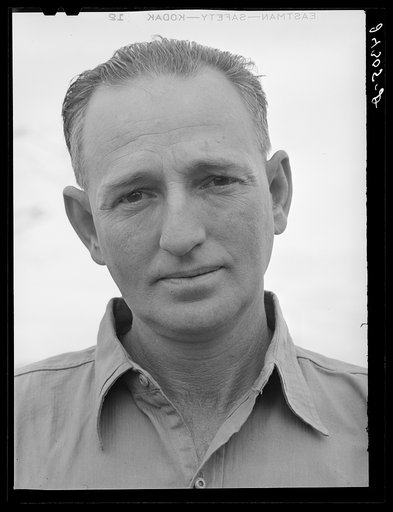 Migrant field worker. Tulare migrant camp. Visalia, California