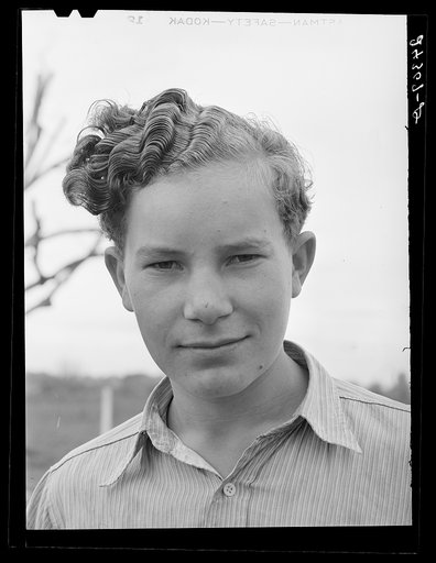 Son of migrant. Tulare migrant camp. Visalia, California