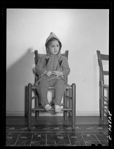 Untitled photo, possibly related to: Elizabeth Darkey, daughter of one of the project families, waiting in the health center to be inoculated against measles. Dailey, West Virginia