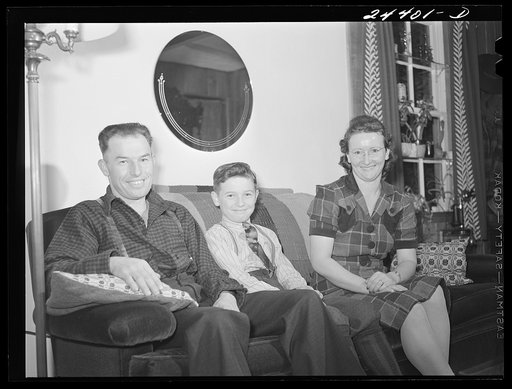 Untitled photo, possibly related to: The Hardeman family at home late Saturday afternoon. Mr. Hardeman has returned from Morgantown, West Virginia, where he works during the week, to spend the weekend at home. Mrs. Hardeman is very interested in the weaving program. Dailey, West Virginia