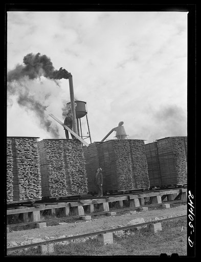 Untitled photo, possibly related to: Stacks of lumber from the sawmill that will be converted into dimension pieces in the mill. Dailey, West Virginia