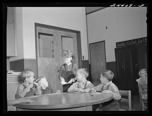 Nursery school group drawing pictures. Homestead school, Dailey, West Virginia