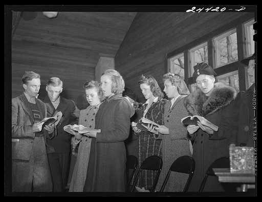Group singing hymns at the opening of the Sunday school. While there are no churches on the project there are five or six in the area close by. This one is just off the project and is attended by many project members. Dailey, West Virginia