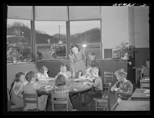 Untitled photo, possibly related to: Nursery school group drawing pictures. Homestead school, Dailey, West Virginia