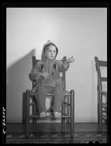 Untitled photo, possibly related to: Elizabeth Darkey, daughter of one of the project families, waiting in the health center to be inoculated against measles. Dailey, West Virginia