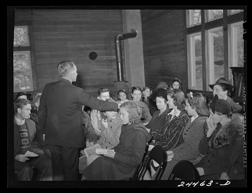 Mr. Merritt, superintendent of the Sunday school, passing the collection plate. Dailey, West Virginia