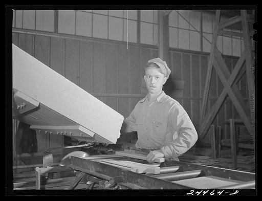 Untitled photo, possibly related to: Worker at dimension lumber plant. Dailey, West Virginia
