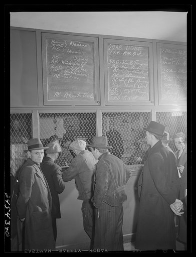 Listing ships in need of sailors. Hiring hall, National Maritime Union. New York City