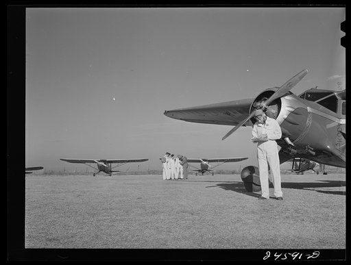 Untitled photo, possibly related to: Lee Bowman, director of civilian pilot training school. Meacham Field, Fort Worth, Texas
