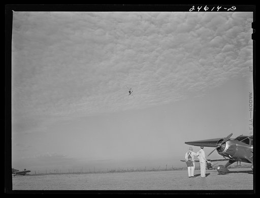 Lee Bowman, director of civilian pilot training school. Meacham Field, Fort Worth, Texas