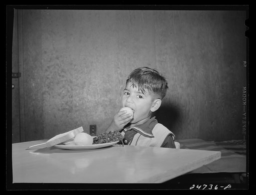 Robstown, Texas. FSA (Farm Security Administration) migratory workers' camp. Children are taught to eat fresh vegetables at lunch in nursery school