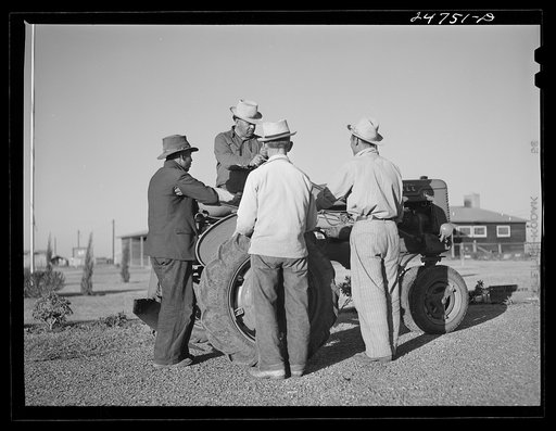 Campers examine tractor used in community garden. FSA (Farm Security Administration) camp. Robstown, Texas