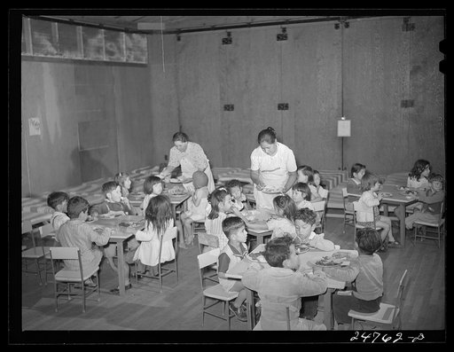 Members of mother's committee serve lunch at nursery school. FSA (Farm Security Administration) camp. Robstown, Texas