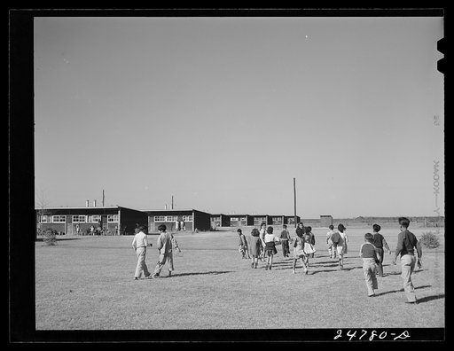 Children coming home after school. Robstown camp, Texas