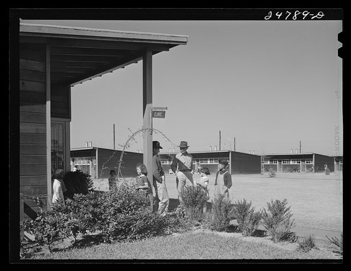 Campers waiting their turn at clinic. Robstown camp, Texas