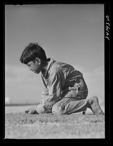Playing marbles. FSA (Farm Security Administration) camp, Robstown, Texas