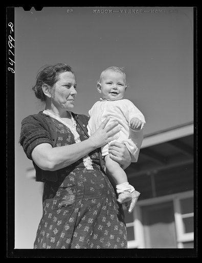 A camper and her baby. Robstown camp, Texas