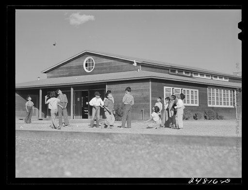 Flying model airplanes. FSA (Farm Security Administration) camp, Robstown, Texas