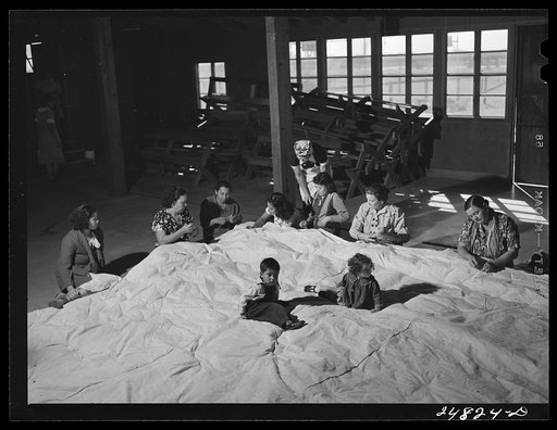 Women's committee at work on mat for athletics. FSA (Farm Security Administration) camp, Robstown, Texas