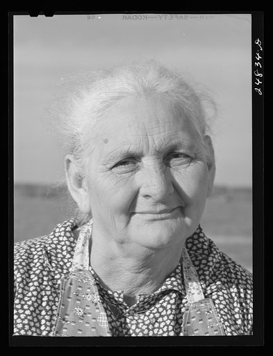 Untitled photo, possibly related to: Mother of migratory worker. FSA (Farm Security Administration) camp, Robstown, Texas
