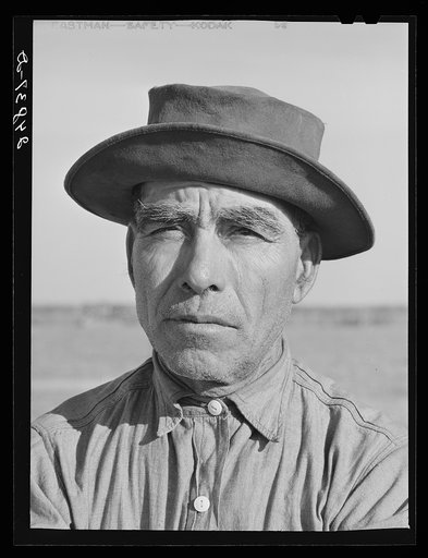 Migratory farm worker. FAS (Farm Security Administration) camp, Robstown, Texas