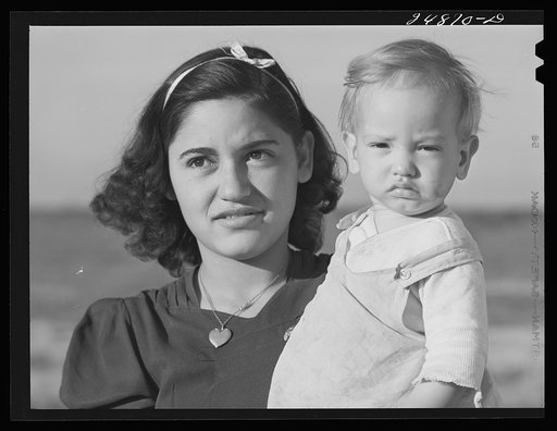 Untitled photo, possibly related to: Migratory worker's wife and child. FSA (Farm Security Administration) camp, Robstown, Texas