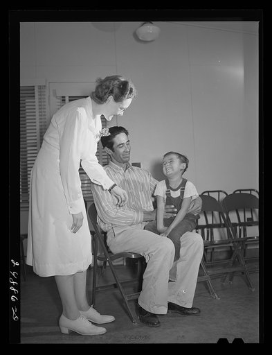 Doris Dill, nurse, and patient in clinic. Robstown camp, Texas