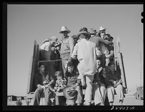 Migratory workers returning from day's work. Robstown FSA (Farm Security Administration) camp, Texas