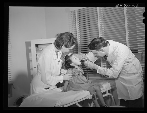 Untitled photo, possibly related to: Nurse Doris Dill with young patient. Robstown, Texas