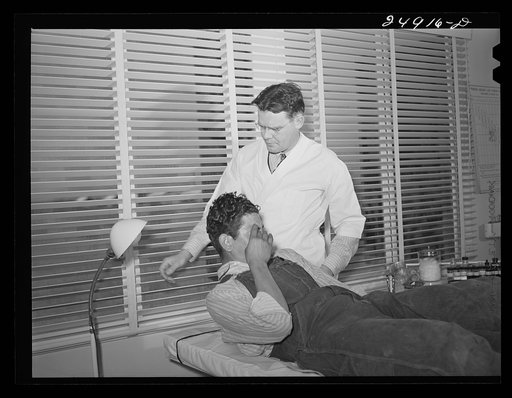 Untitled photo, possibly related to: Doctor examining patient. Robstown FSA (Farm Security Administration) camp, Texas
