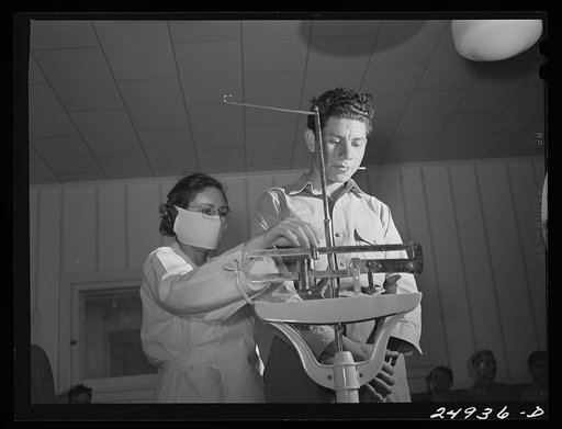 Untitled photo, possibly related to: Corpus Christi, Texas. Privately supported tuberculosis clinic supervised by a retired doctor. Majority of patients are Latin-American. Patient on scale