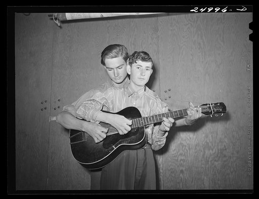 Untitled photo, possibly related to: Weslaco, Texas. FSA (Farm Security Administration) camp. Drake family playing for a Saturday night dance