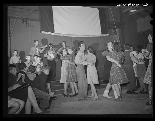 Untitled photo, possibly related to: Weslaco, Texas. FSA (Farm Security Administration) camp. Drake family playing for a Saturday night dance