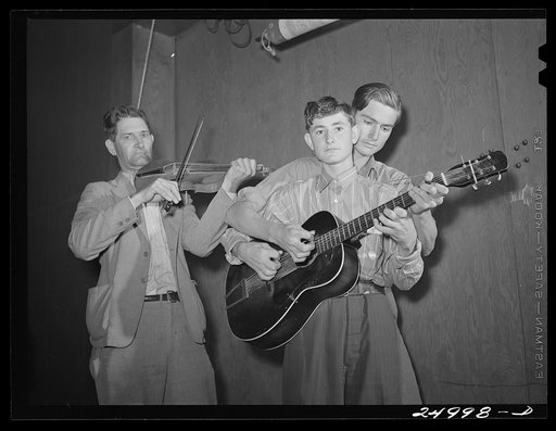 Untitled photo, possibly related to: Weslaco, Texas. FSA (Farm Security Administration) camp. Drake family playing for a Saturday night dance